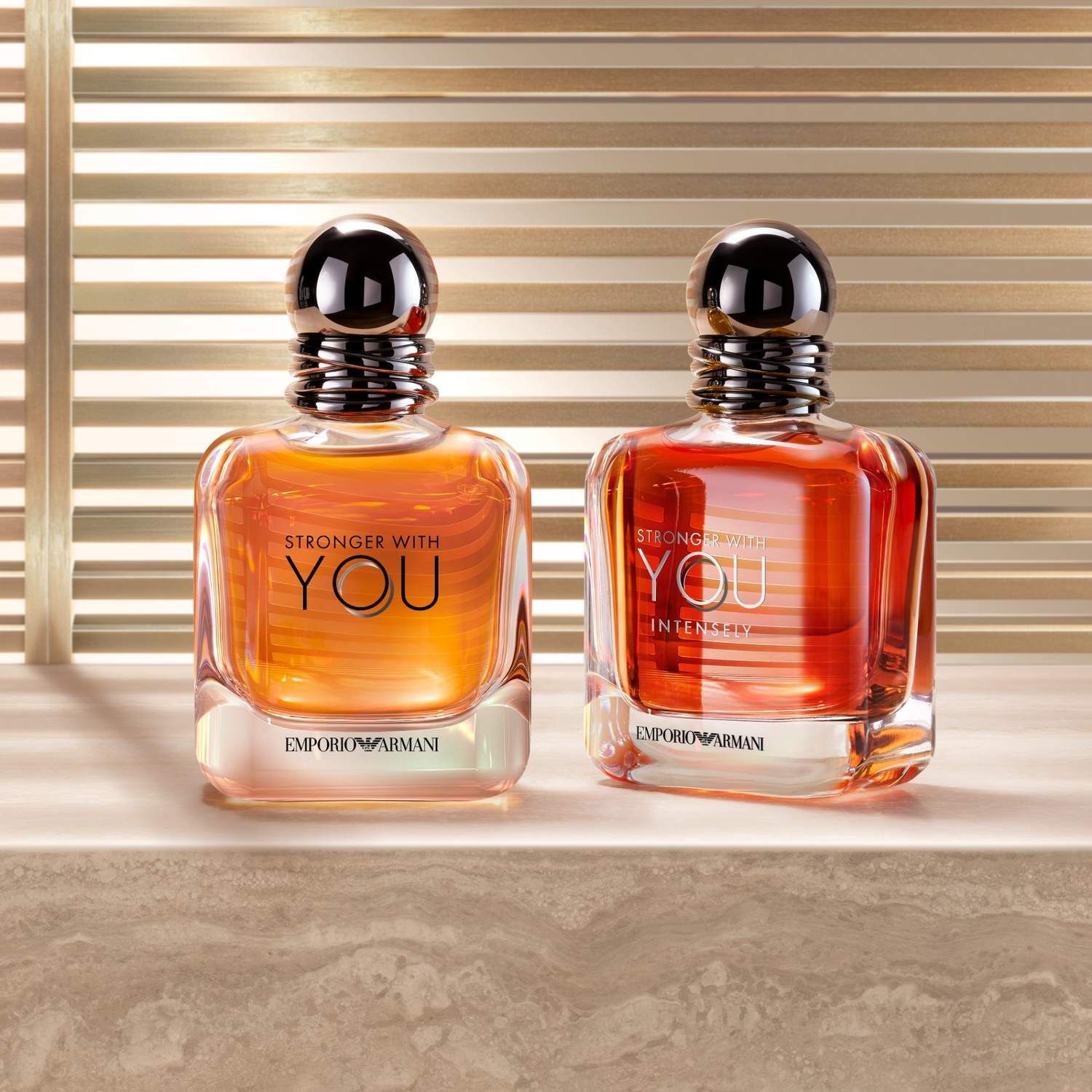 Deux flacons de parfum Giorgio Armani : Si et Acqua di Gio.