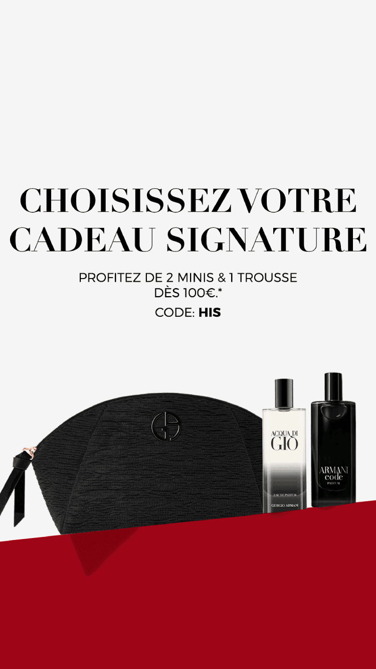 Armani Code Elixir fragrance bottle on a black leather background.