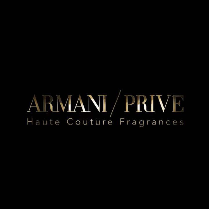A black background featuring the text "ARMANI/PRIVE" in gold, labeled as "Haute Couture Fragrances."