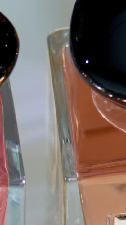 Armani/Prive fragrance bottles (The Yulong, Vetiver d'Hiver, Pivoine Suzhou, Orange Mediterranee) are shown alongside vibrant flowers and fruits, highlighting the natural inspiration behind these luxurious perfumes.