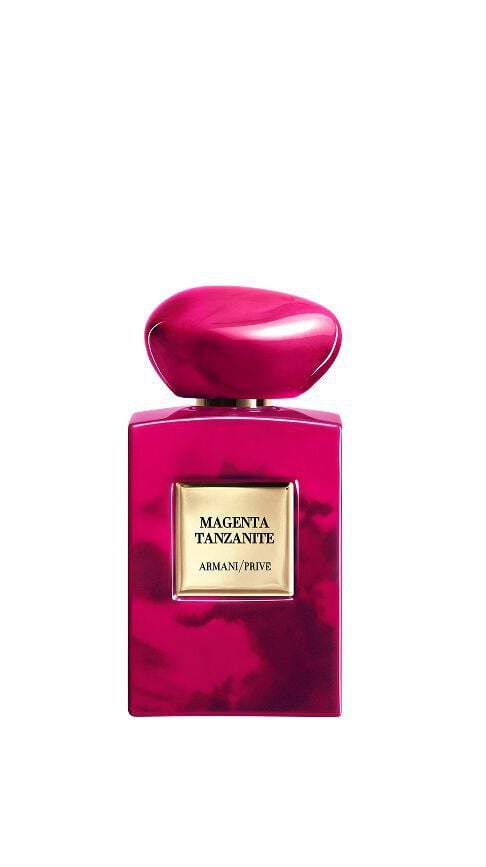 Armani/Prive Magenta Tanzanite: an intense magenta bottle with dark marbling, evoking the vibrant warmth of a savannah sunrise and the spicy energy of ginger and cardamom.