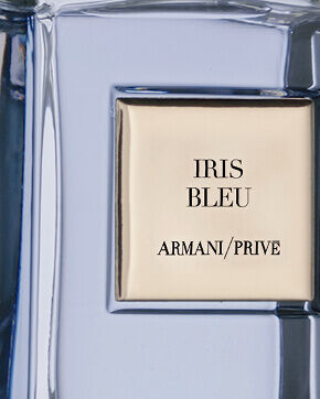 Iris Bleu hero video showcasing a its cristal bottle a Woman Silhouette and its main ingredients
